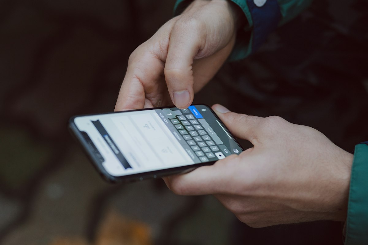 Phone screen with WhatsApp messages